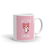 mug with waving cat and pink background that says JUST KEEP SMILLING