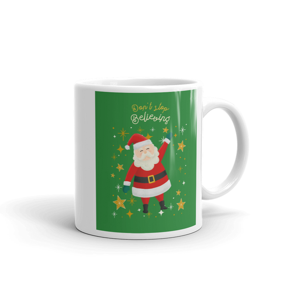 Coffee Mug with Santa on green background says Don't Stop Believing