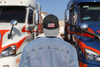 Banana-Republic-trucker-hat-mockup-of-a-man-seen-from-behind